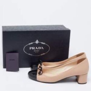 Designer Prada pumps.
